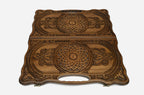 Angled view of the twin rosette carved backgammon board