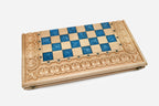 Close-up of the brass coordinate markers around the board