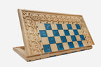 Overhead view of the blue epoxy board and full set of pieces