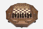 Octagonal honey-walnut chess set with detailed carved pieces set up on the board