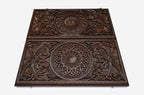 Side view of the closed carved board