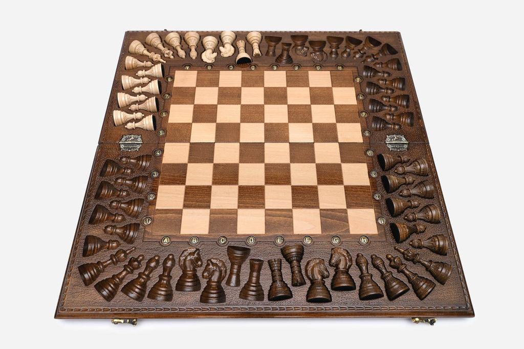 Close-up of the walnut and bronze pieces on the maple and walnut squares