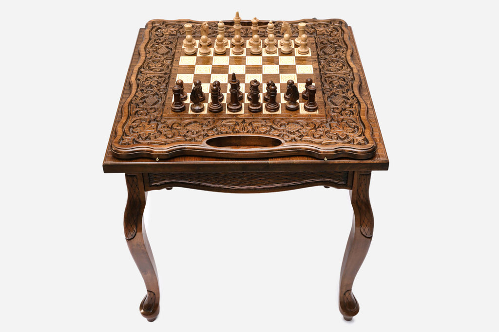 Handle Castle-Style chess and backgammon table set up for chess, angled view
