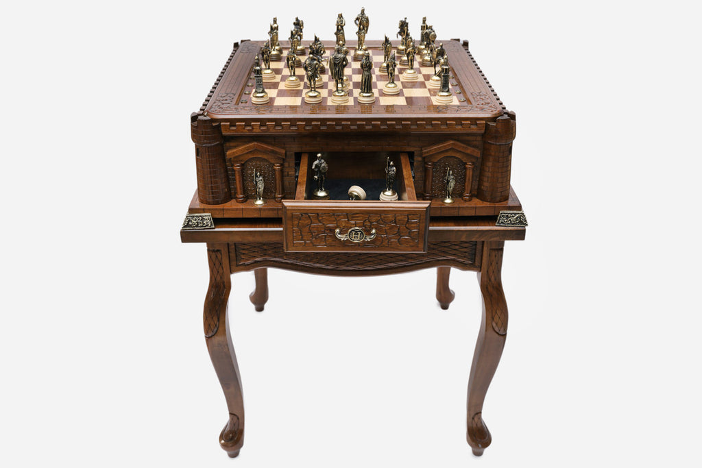 Handle Castle-Style game table with chess pieces set up and the drawer open showing spare pieces