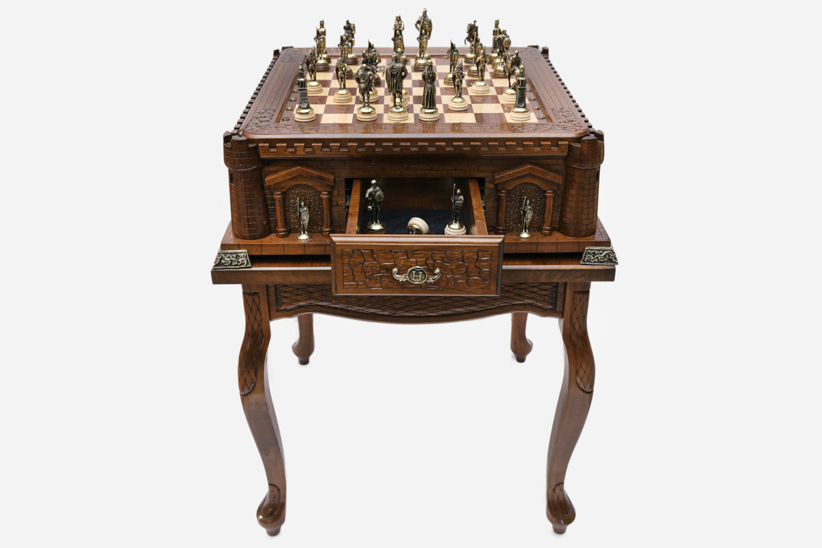 Handle Castle-Style game table with chess pieces set up and the drawer open showing spare pieces