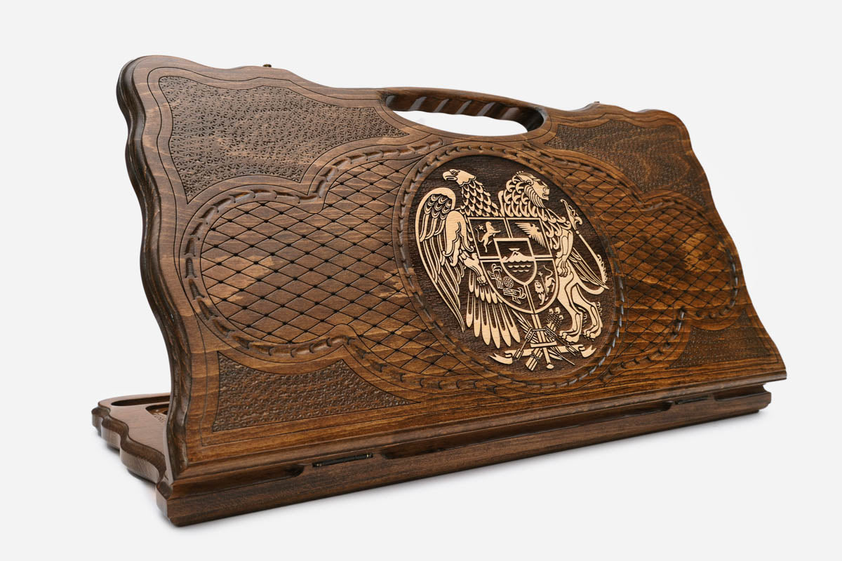 Carved beechwood backgammon board with the Armenian coat of arms in bronze, with a carry handle, propped open