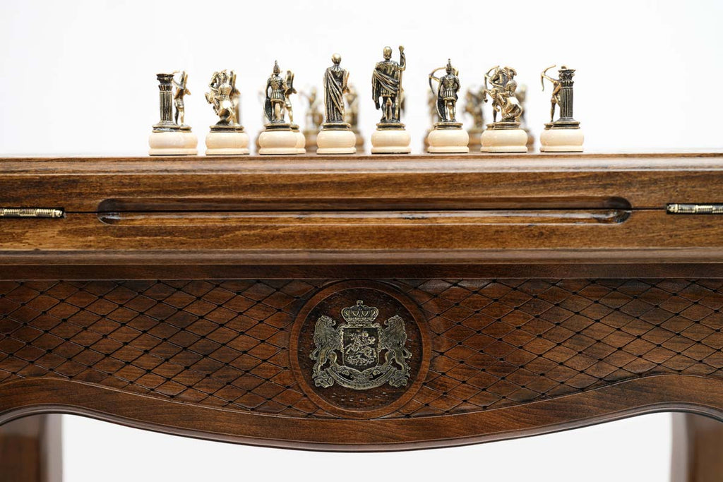 Close-up of the backgammon checkers and dice cup on the Handle Georgian Coat of Arms table