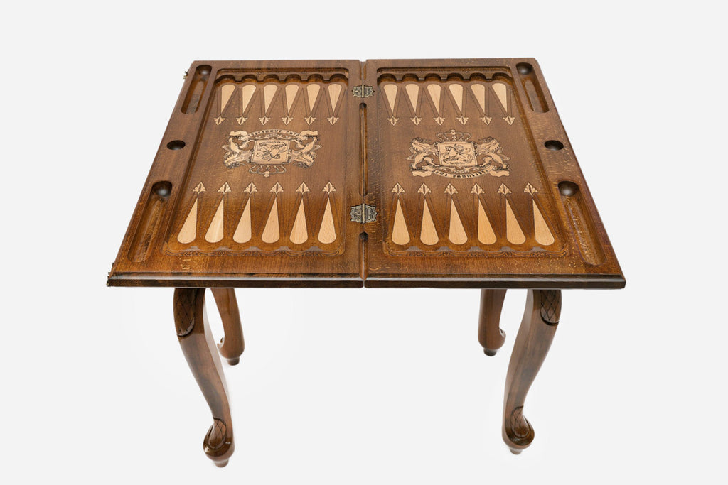 Close-up of the Handle Georgian Coat of Arms table leg and drawer carving