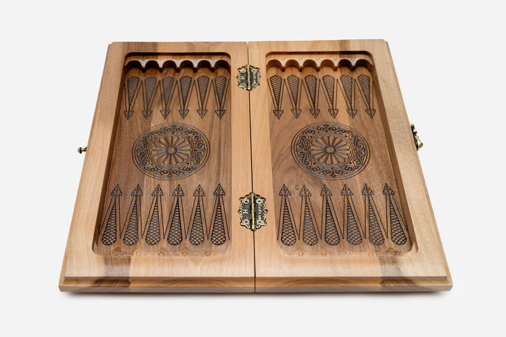 Overhead view of the green epoxy board with the full set of wooden pieces