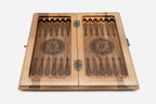 Overhead view of the green epoxy board with the full set of wooden pieces