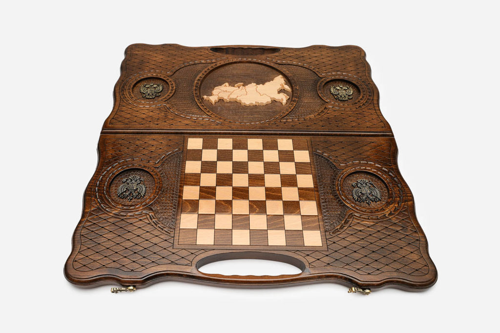 Angled view of the map of Russia bronze carved backgammon board