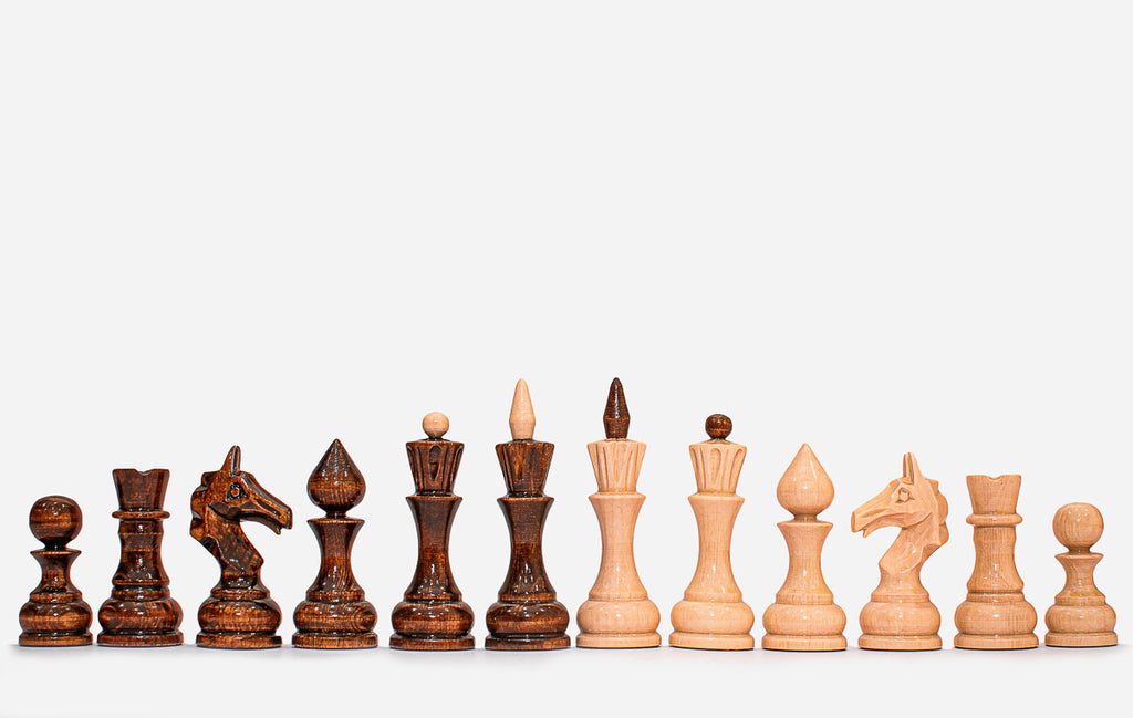 Close-up of the dark walnut chess pieces