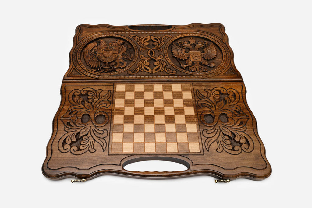 Angled view of the Armenia and Russia coat of arms carved backgammon board