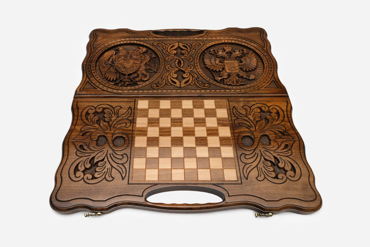 Angled view of the Armenia and Russia coat of arms carved backgammon board