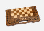 Detail of the beech and walnut chess pieces on the inlaid squares