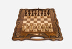 Walnut folding chess board with a carved Mount Ararat inlay and foliate scrollwork, set up with wooden pieces