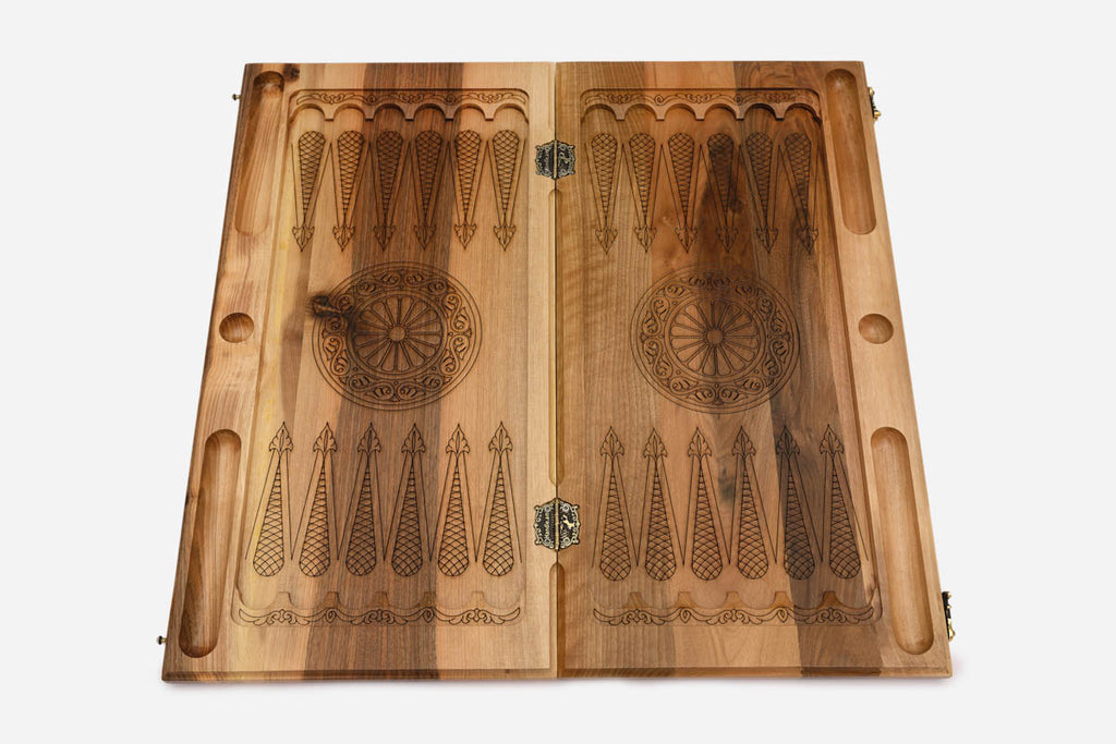 The blue tree design across the closed exterior of the board