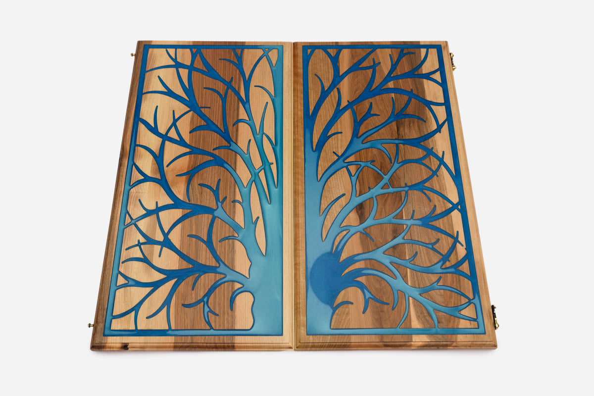 Angled view of the blue tree epoxy backgammon board