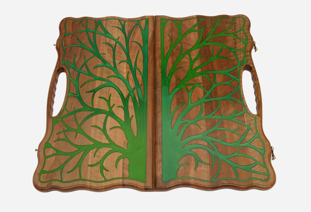 Angled view of the green tree epoxy backgammon board with carry handle