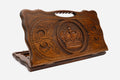 Carved beechwood backgammon board with a royal crown medallion and a carry handle, propped open