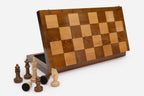 Classic chess set shown folded with carry handle