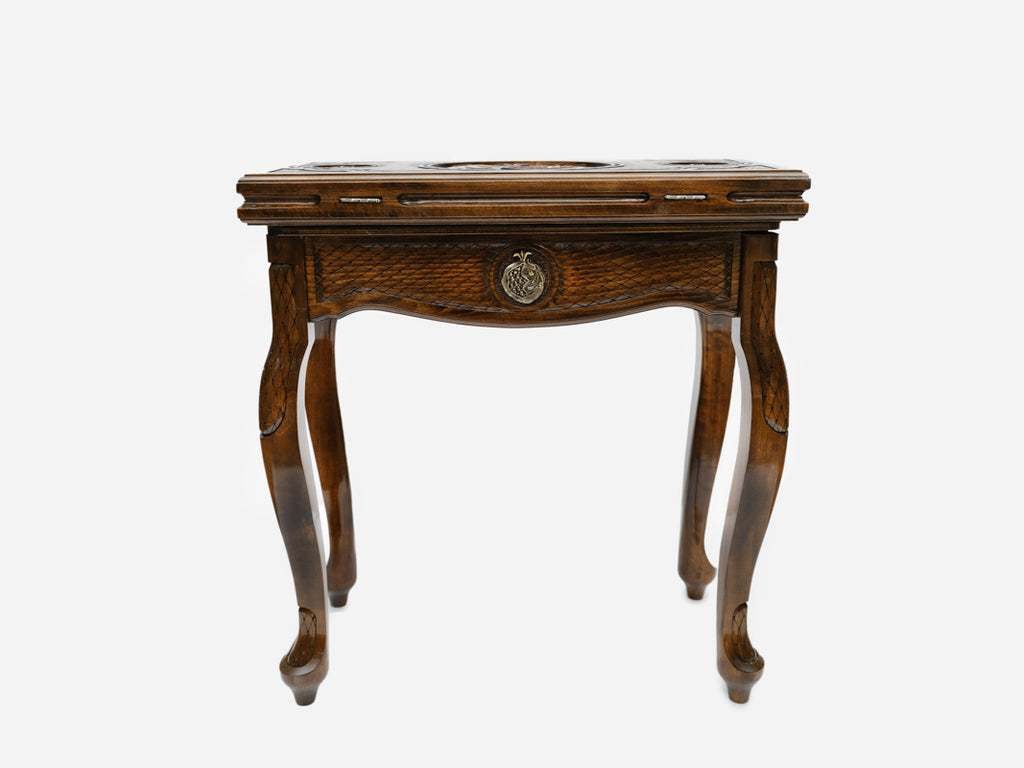 Handle Pomegranate Bronze table opening to reveal the backgammon board