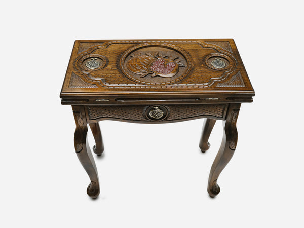 Handle Pomegranate Bronze backgammon table closed, front view showing the bronze medallions