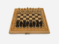 Folding chess board in pale wood with brown marbled epoxy squares, a carved gothic border and figural wooden pieces set up for play