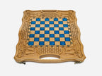 The blue epoxy folding chess set shown closed, ready to carry