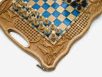 Close-up of the blue epoxy squares, carved wheat-and-basket-weave border and carry-handle cutout