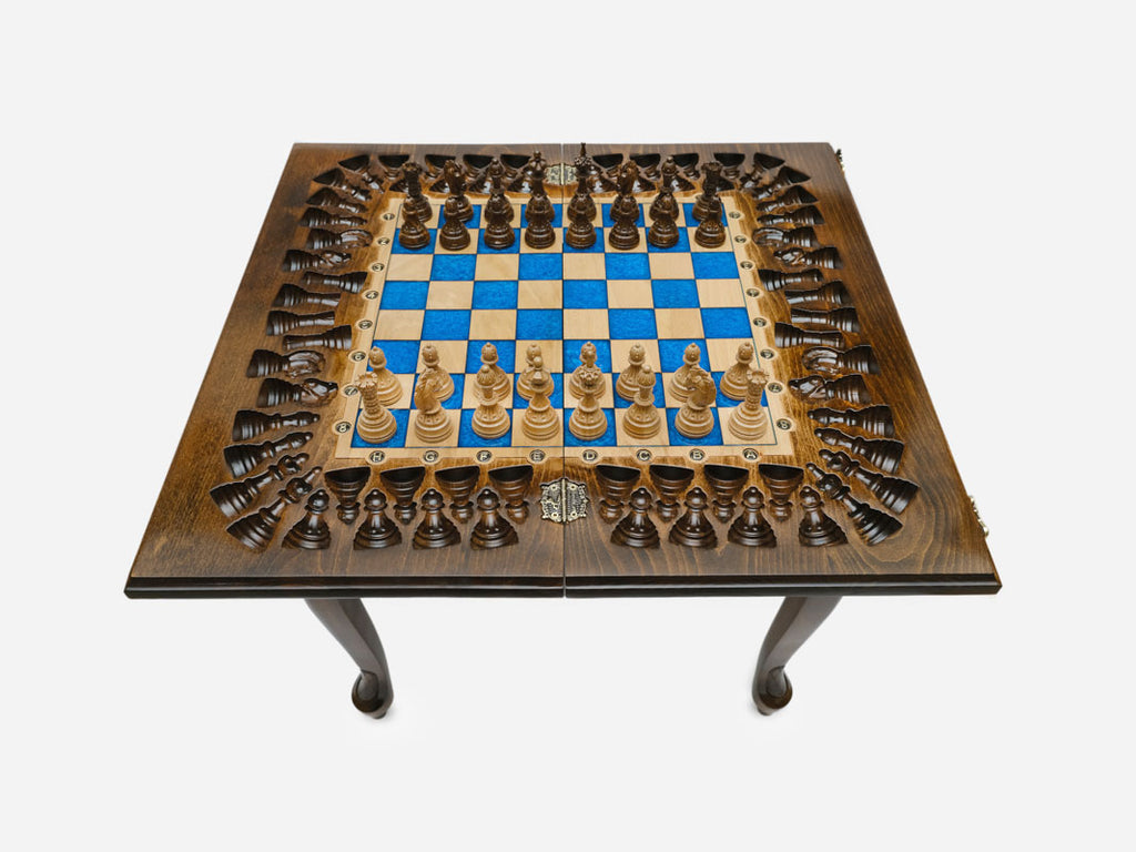 Close-up of the turned wooden chess pieces on the epoxy board