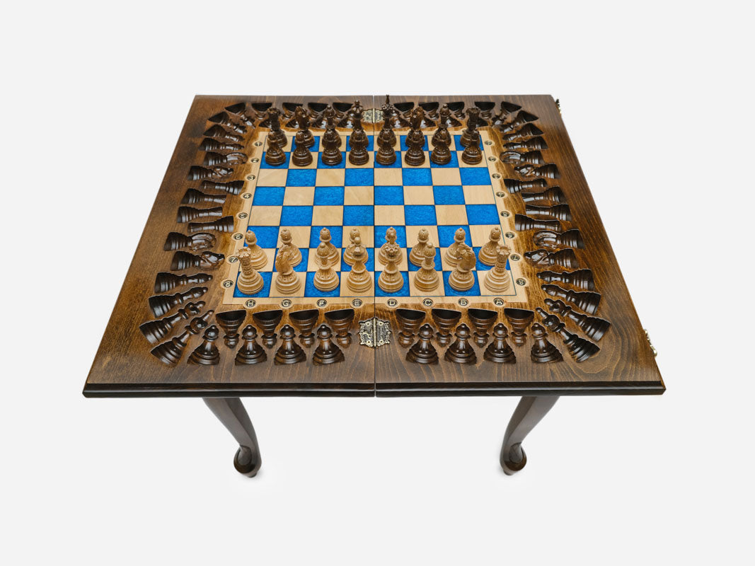 Close-up of the turned wooden chess pieces on the epoxy board