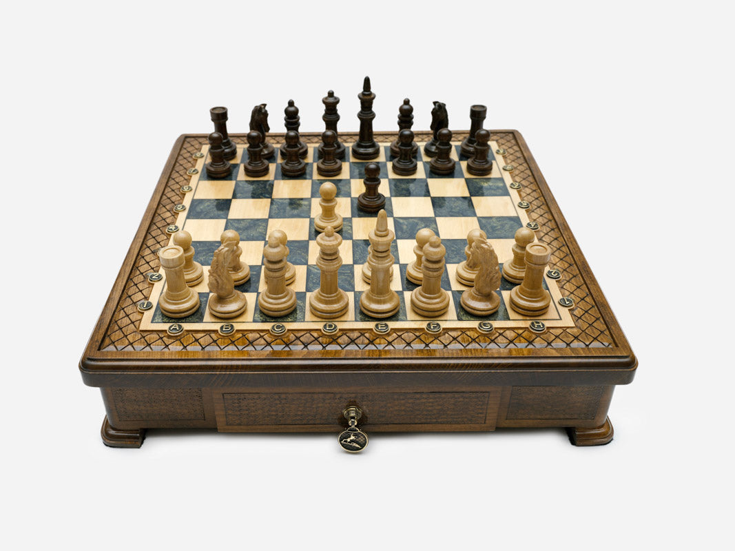 Handle Gray Epoxy chess set with wood pieces set up for play, front view