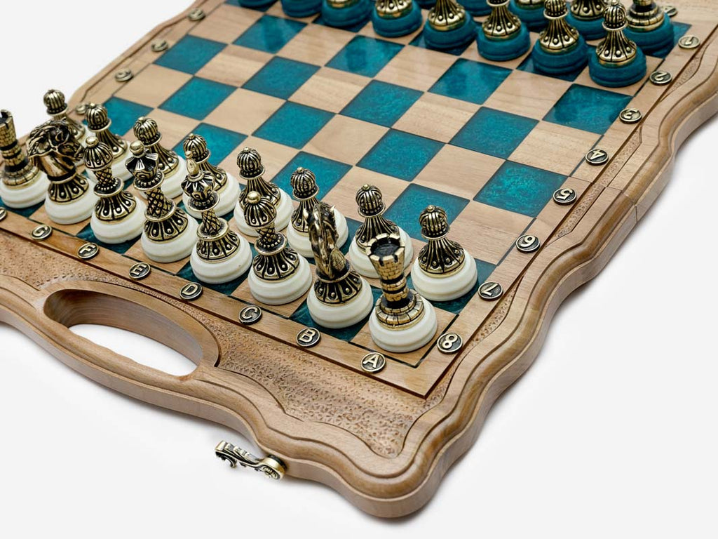 The blue epoxy folding chess set shown closed, ready to carry