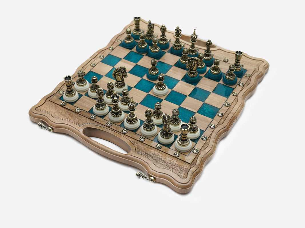 The folding board partly closed, showing its briefcase form and bronze fittings