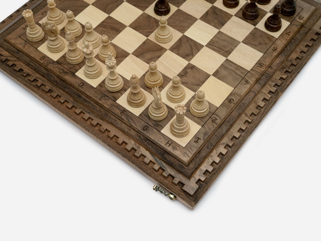 Close-up of a lattice design carving on the walnut board