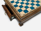 Close-up of the blue epoxy board corner on the Handle chess set
