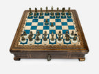 Handle Blue Epoxy chess set with bronze pieces set up for play, front view