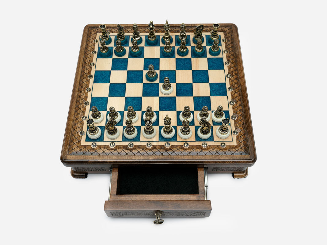 Handle Blue Epoxy chess set top-down view with pieces set up and drawer open