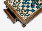 Close-up of the Handle Blue Epoxy chess set drawer corner with bronze pieces