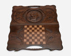 Angled view of the sailing ship carved backgammon board