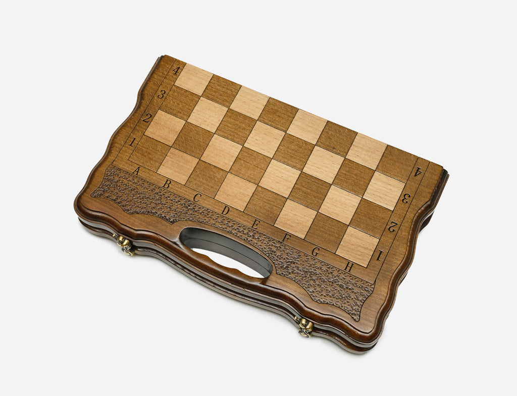 Classic chess and backgammon set shown folded with carry handle