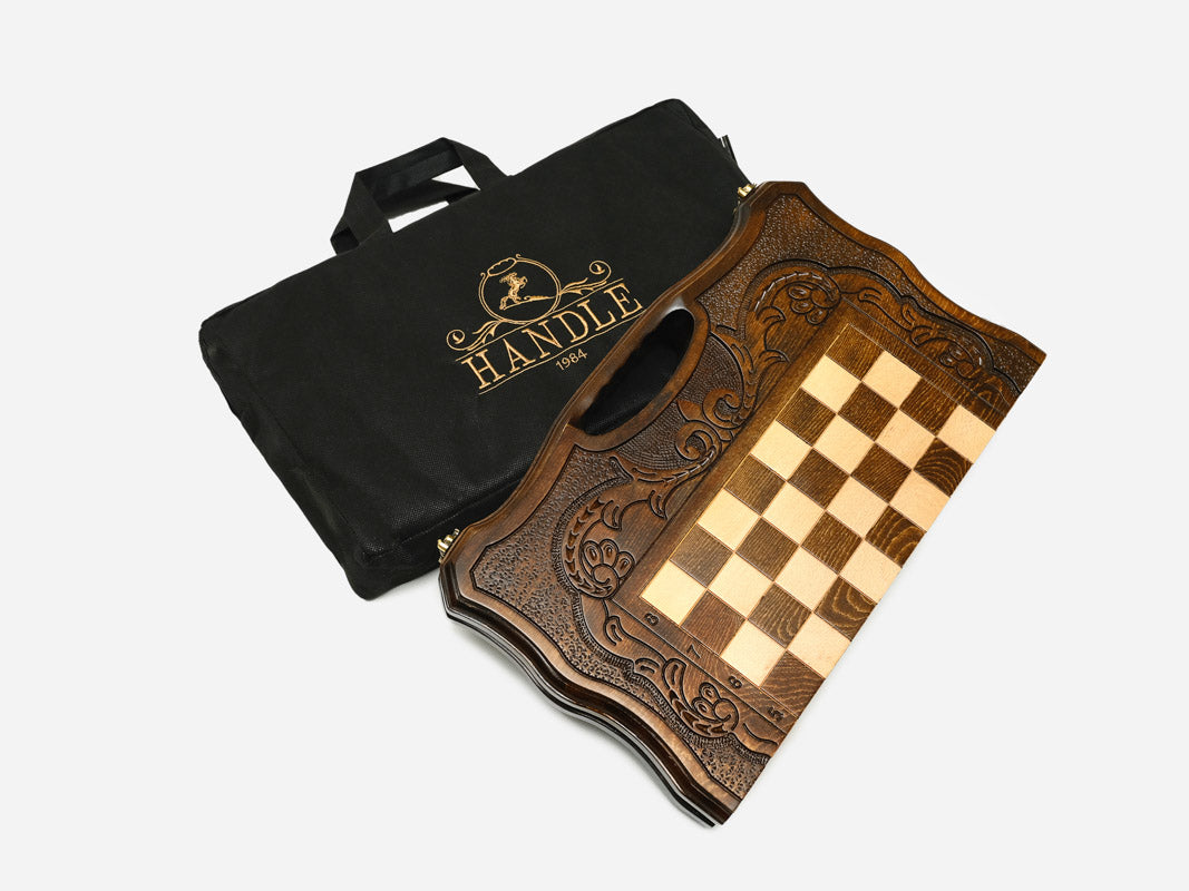 The carved folding chess set shown closed, ready to carry