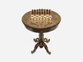 Hand-carved round wooden chess table with a full chess set arranged on the board