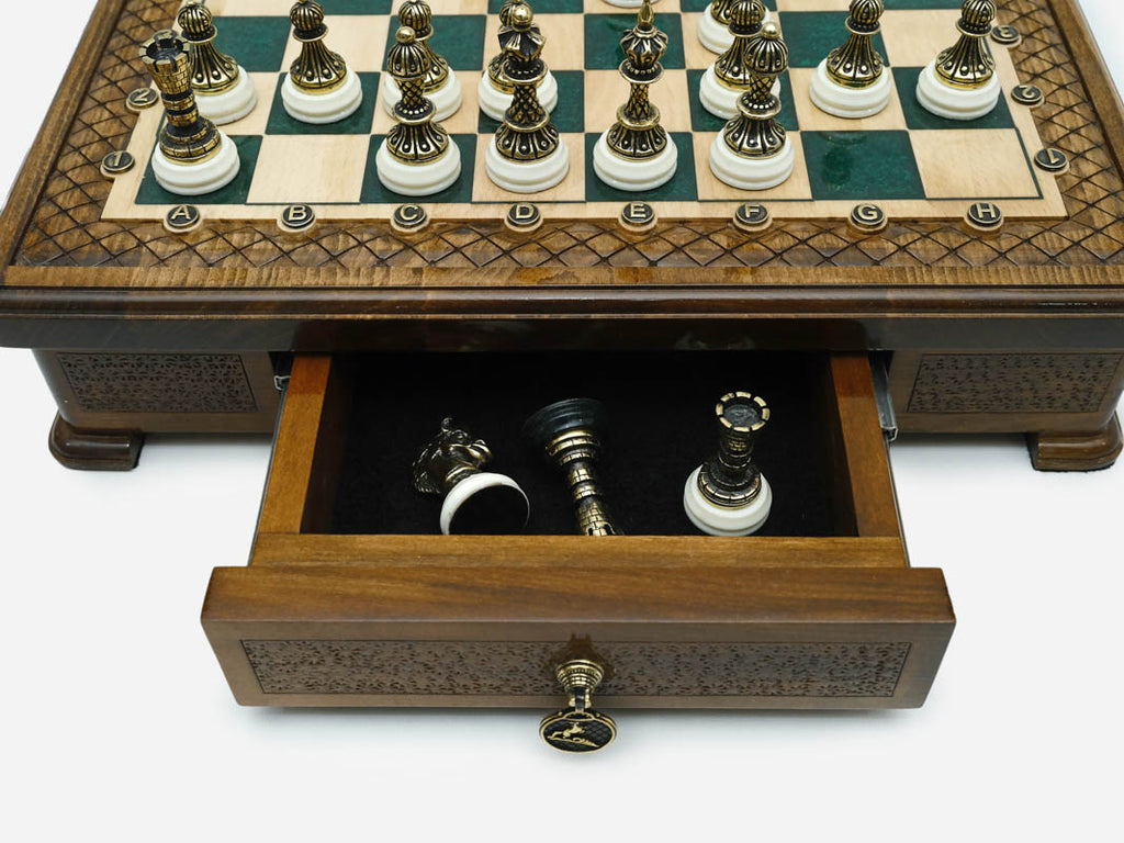 Close-up of the Handle Green Epoxy chess set drawer with bronze pieces stored inside