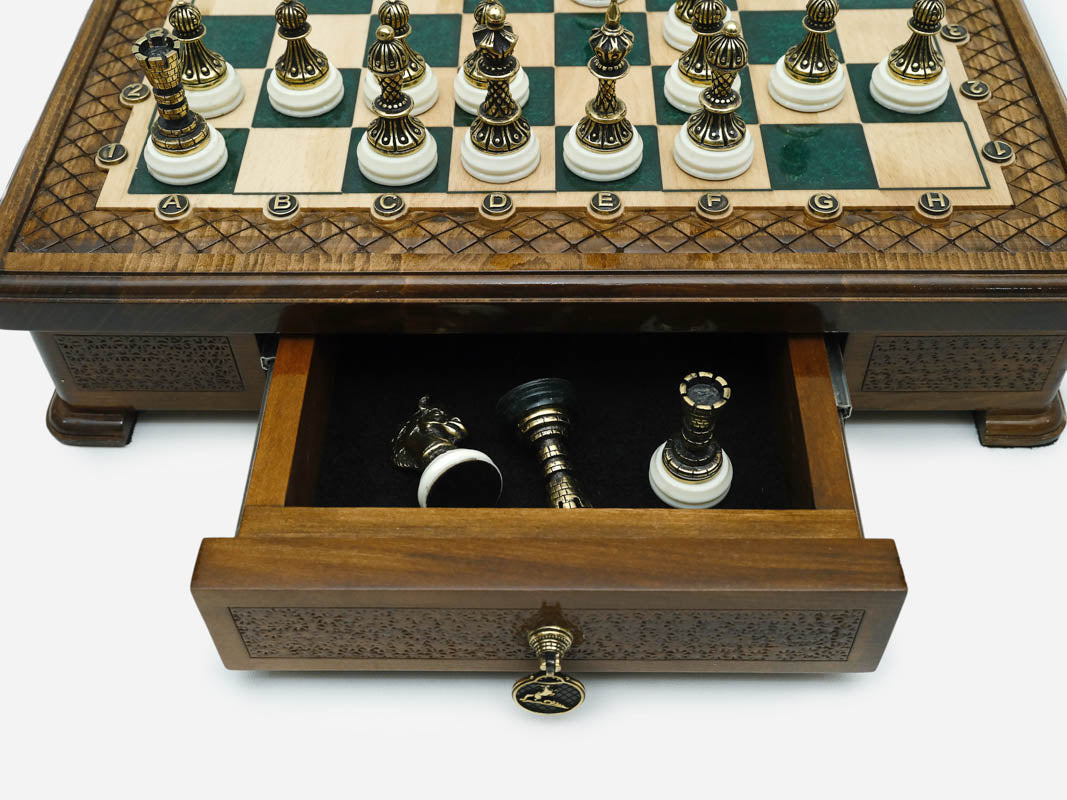 Close-up of the Handle Green Epoxy chess set drawer with bronze pieces stored inside