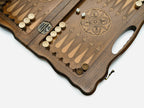 Carved chess and backgammon set shown folded