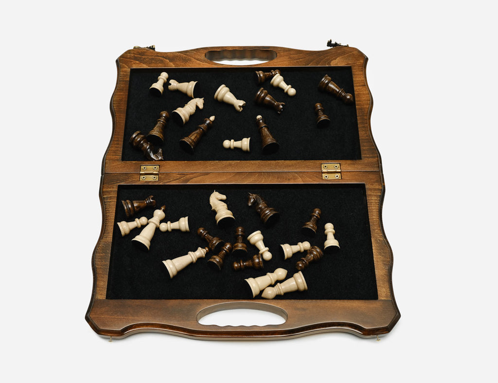 Angled view of the folding chess set with beech and walnut Staunton pieces set up