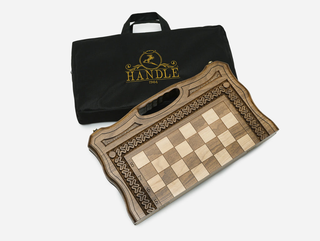 Side view of the closed carved chess board with integrated handle