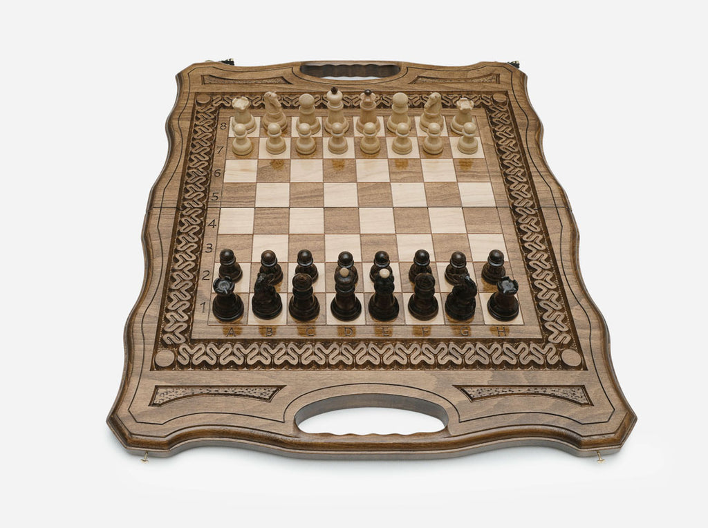 Detail of the beech and walnut Staunton chess pieces on the maple and walnut squares